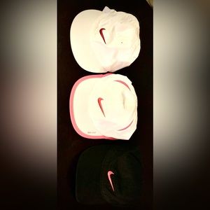 3 girls Nike hats size 4/6X. Colors- white/pink, white, and black.